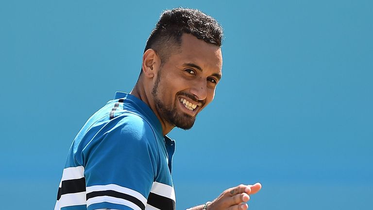 Australia's Nick Kyrgios reacts against Britain's Kyle Edmund during their men's singles second-round match at the ATP Queen's Club Championships tennis tournament in west London on June 21, 2018.