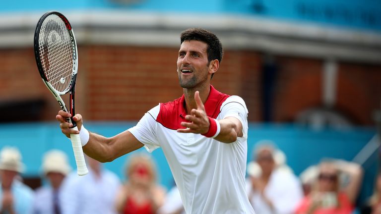 Novak Djokovic of Serbia celebrates winning his match against John Millman of Australia on Day Two of the Fever-Tree Championships at Queens Club on June 19, 2018 in London, United Kingdom.