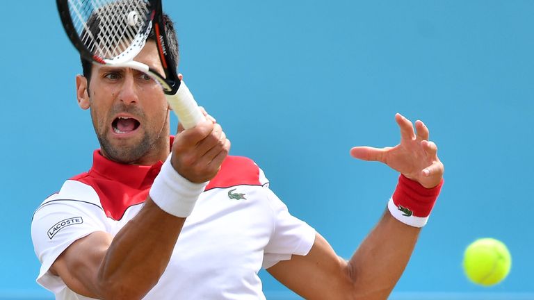 Serbia's Novak Djokovic returns to France's Jeremy Chardy during their men's singles semi-finals match at the ATP Queen's Club Championships tennis tournament in west London on June 23, 2018.