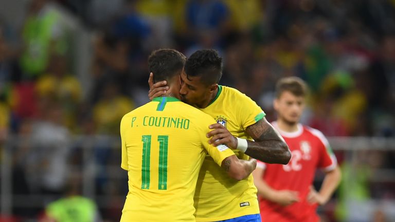 Brazil's midfielder Paulinho (R) celebrates with Philippe Coutinho after scoring during the Russia 2018 World Cup Group E football match v Serbia at the Spartak Stadium in Moscow on June 27, 2018.