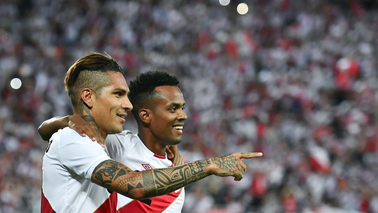 Peru's forward Paolo Guerrero (L) celebrates with a teammate after scoring his team's third goal during an international friendly football match Saudi Arabia vs Peru at Kybunpark stadium in St. Gallen, on June 3