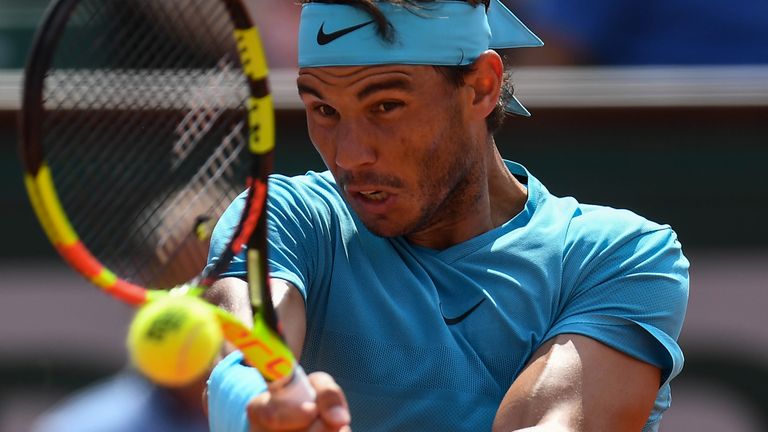 Spain's Rafael Nadal returns the ball to Argentina's Juan Martin del Potro during their men's singles semi-final match on day thirteen of The Roland Garros 2018 French Open tennis tournament in Paris on June 8, 2018