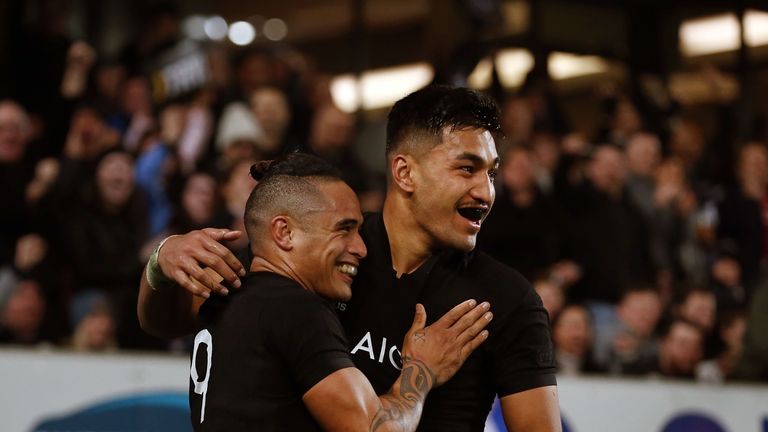 Rieko Ioane celebrates with Aaron Smith after scoring a try for New Zealand against France