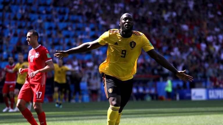 Romelu Lukaku wheels away from goal after doubling Belgium's lead