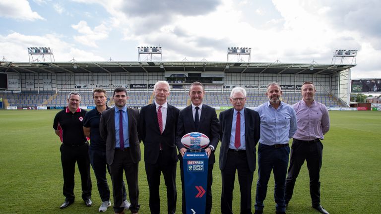 The new BetFred Super League CEO Robert Elstone poses after the press conference with Mike Rush (St Helens), Simon Moran (Warrington Wolves) Karl Fitzpatrick (Warrington Wolves), Eammon McManus (Saint Helens), Robert Elstone (CEO Super League), Ian Lenegan (Wigan Warriors), Ian Blease (Salford Red Devils), Kris Radlinski (Wigan Warriors)