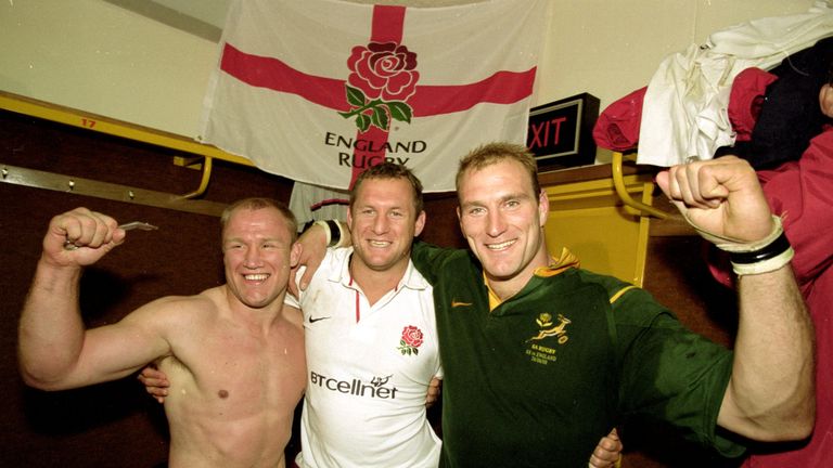 England's Neil lBack, Richard Hill and Lawrence Dallaglio celebrate victory over South Africa in Bloemfontein in 2000