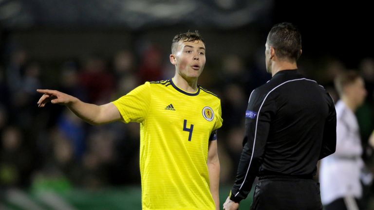 LIPPSTADT, GERMANY - MARCH 21: Ryan Porteous of Scotland talks to referee Daniele Doveri during the Under 19 Euro Qualifier between Germany and Scotland on March 21, 2018 in Lippstadt, Germany. (Photo by Juergen Schwarz/Bongarts/Getty Images)