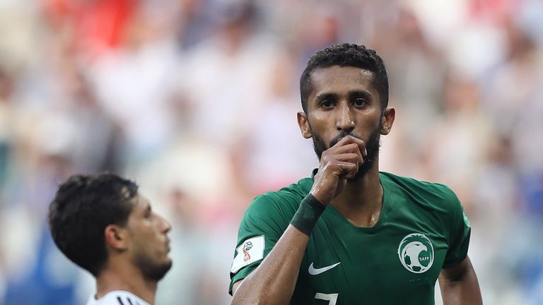 Salman Alfaraj celebrates after scoring Saudi Arabia's equaliser from the penalty spot
