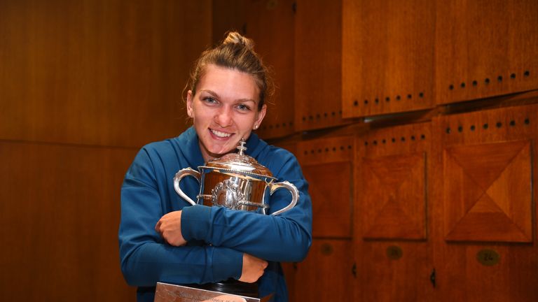Ladies singles winner Simona Halep of Romania celebrates in the dressing room following her victory in the ladies singles final against Sloane Stephens of The United States on day fourteen of the 2018 French Open at Roland Garros on June 9, 2018 in Paris, France.