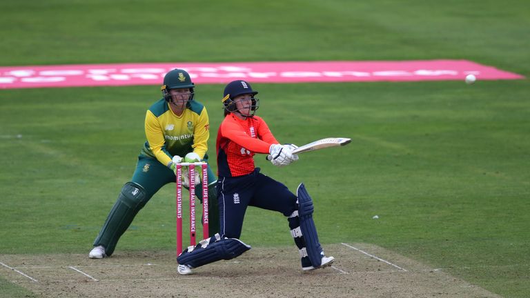 Lizelle Lee of South Africa looks on as Tammy Beaumont of England scores runs
