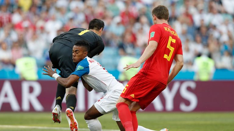 Thibaut Courtois blocks a shot on goal by Edgar Barcenas
