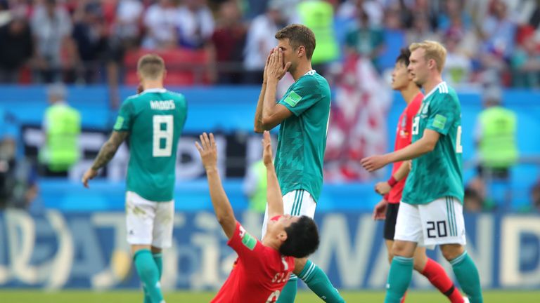 Thomas Mueller reacts to Germany's 2-0 loss to South Korea, resulting in their elimination from the competition