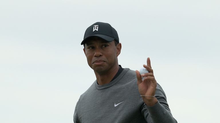 Tiger Woods of the United States waves on the 12th green during the second round of the 2018 U.S. Open at Shinnecock Hills Golf Club on June 15, 2018 in Southampton, New York