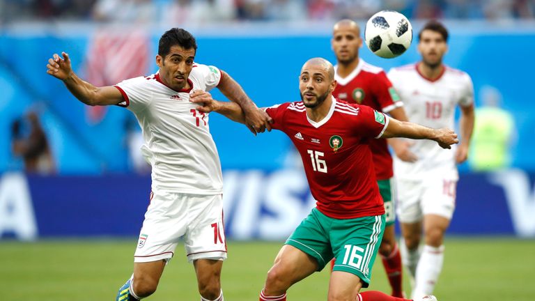 Vahid Amiri and Noureddine Amrabat in action during the 2018 World Cup, group B match between Morocco and Iran