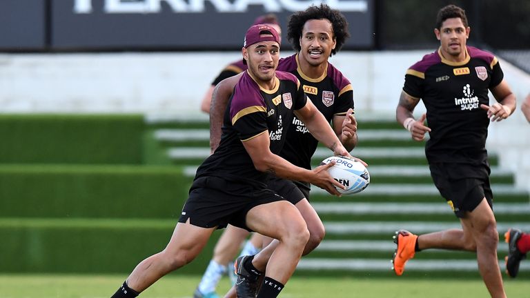 Valentine Holmes runs with the ball during a Queensland Maroons State of Origin training session