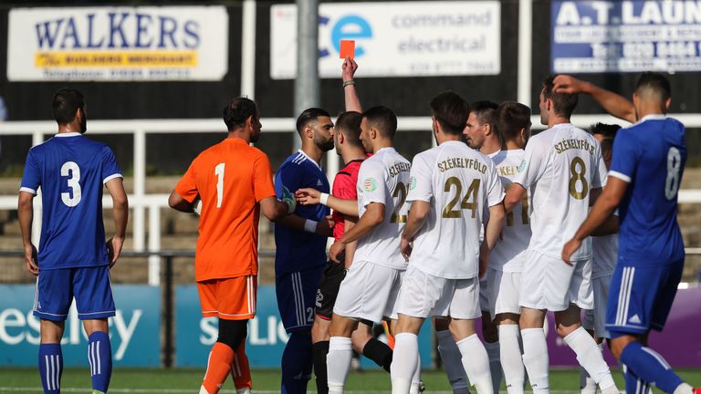 A red card is shown during the CONIFA World Football Cup 2018 match between Szekely Land and Western Armenia at Bromley on June 5, 2018 in London, England. (Photo by Con Chronis/CONIFA)
