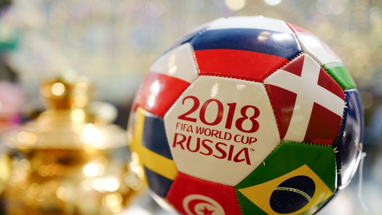 A Russian tourism shop selling a 2018 FIFA World Cup Russia football with flags of the competing nations
