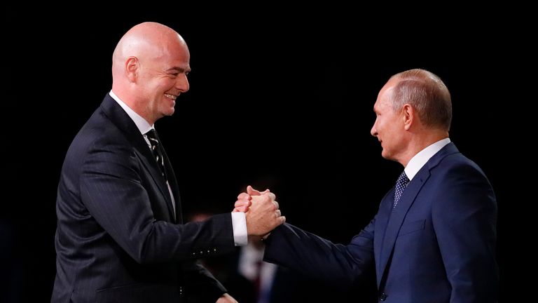 FIFA President Gianni Infantino greeted Vladimir Putin on stage
