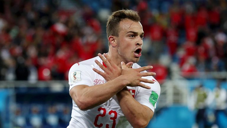 Xherdan Shaqiri celebrates Switzerland's winner against Serbia