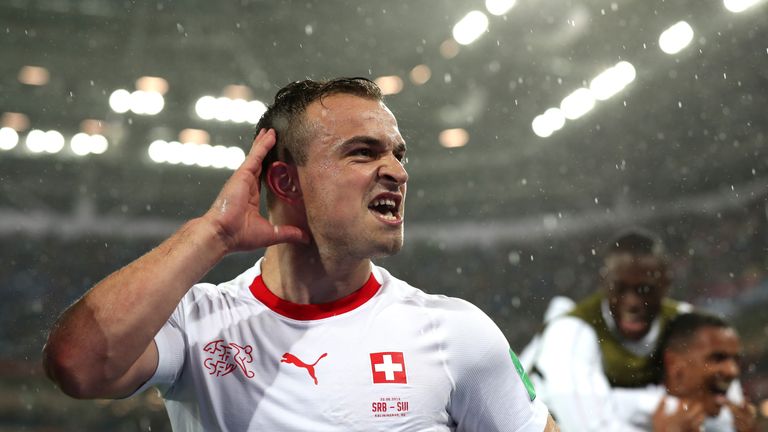 Xherdan Shaqiri celebrates after Switzerland beat Serbia 2-1