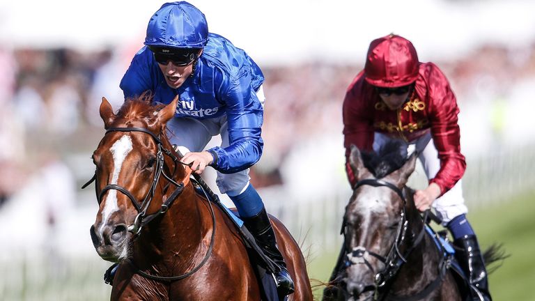 William Buick riding Masar wins the Investec Derby at Epsom