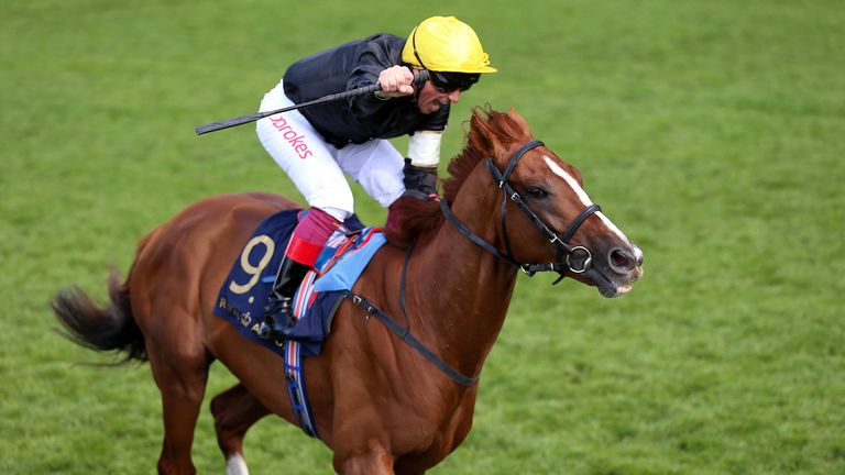 Frankie Dettori celebrates on Stradivarius