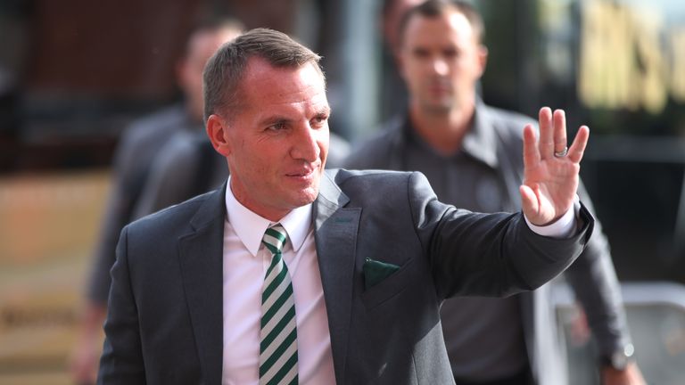 Brendan Rodgers waves to the crowd ahead of Celtic's win