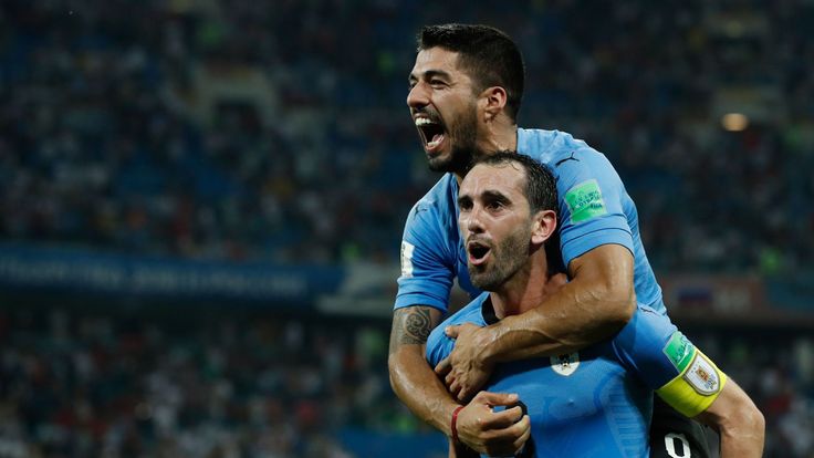 Luis Suarez and Diego Godin celebrate in Uruguay's win over Portugal at the 2018 World Cup