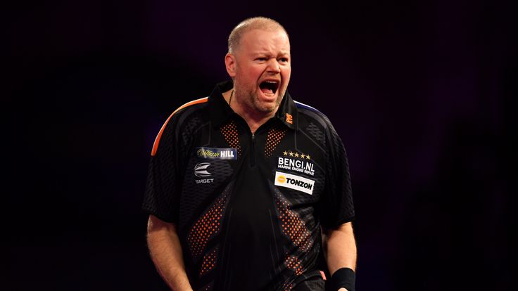 Raymond Van Barneveld celebrates during his Quarter Final Match against Michael Van Gerwen during the 2018 William Hill PDC World Darts Championships on Day Thirteen at Alexandra Palace on December 29, 2017 in London, England