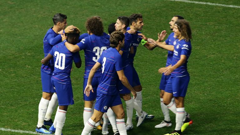Chelsea players celebrate Pedro's opening goal