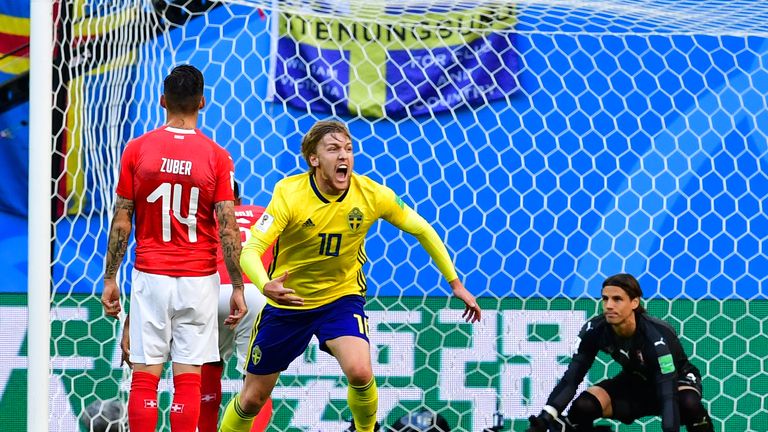 Emil Forsberg celebrates after his deflected strike opens the scoring for Sweden