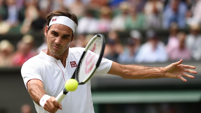 Roger Federer in fourth-round action on centre court