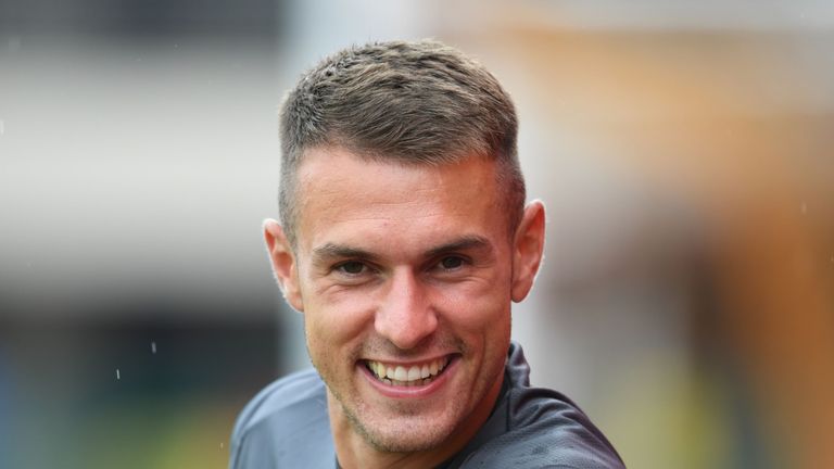 Aaron Ramsey smiles at the camera during a training session at Singapore American School on July 25, 2018