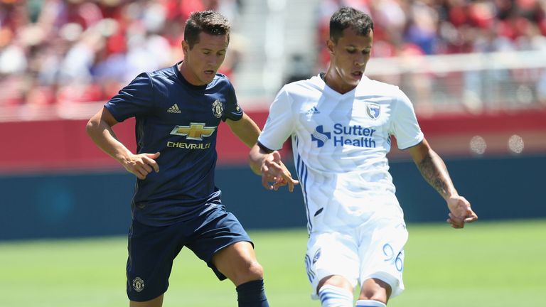 Ander Herrera of Manchester United in action with Luis Felipe of San Jose Earthquakes