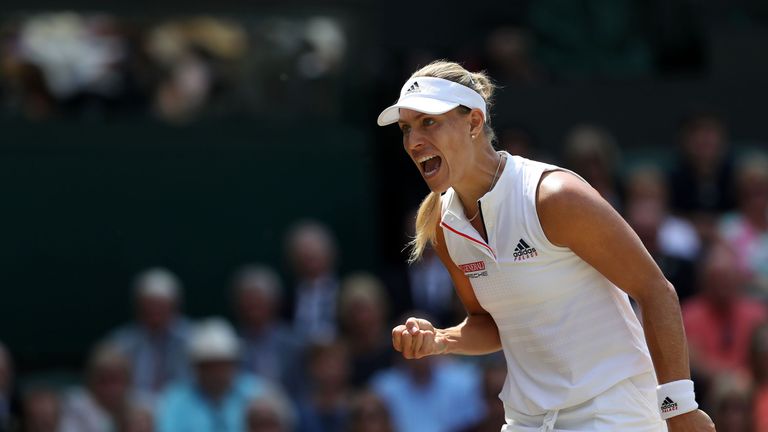 Germany's Angelique Kerber celebrates a point against Latvia's Jelena Ostapenko during their women's singles semi-final match on the tenth day of the 2018 Wimbledon Championships at The All England Lawn Tennis Club in Wimbledon, southwest London, on July 12, 2018