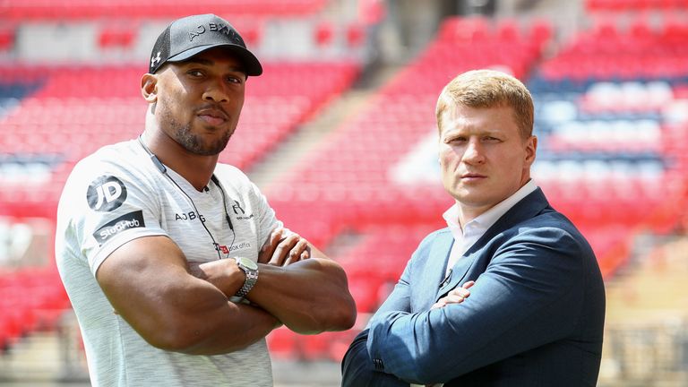 Anthony Joshua and Alexander Povetkin pose for photographs during a press conference at Wembley Stadium
