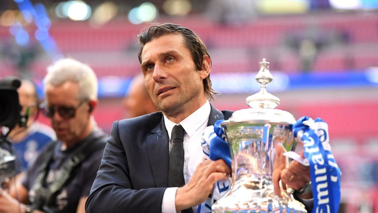 Antonio Conte poses with the FA Cup at Wembley Stadium on May 19, 2018