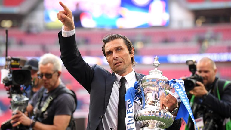 Antonio Conte poses with the FA Cup at Wembley Stadium on May 19, 2018