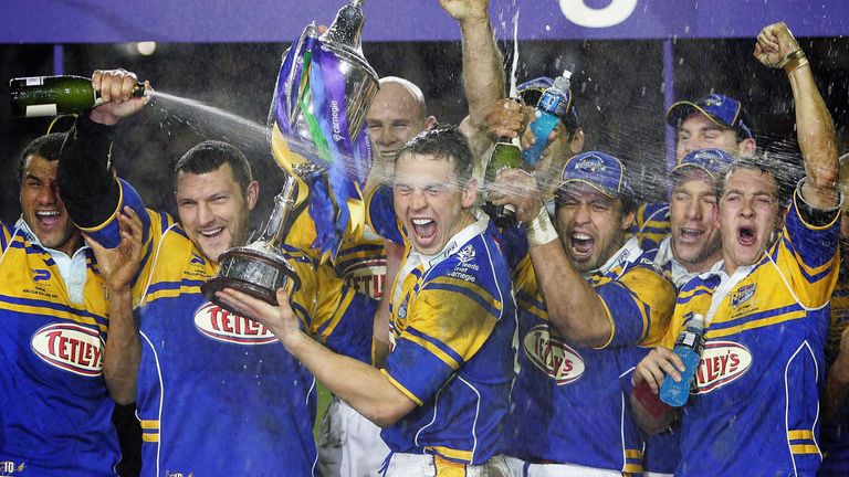 Barrie McDermott covers Kevin Sinfield in champagne following Leeds' win over the Canterbury Bulldogs in the 2005 World Club Challenge.