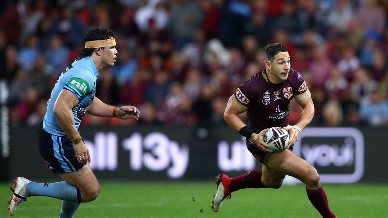 Billy Slater of Queensland runs with the ball 