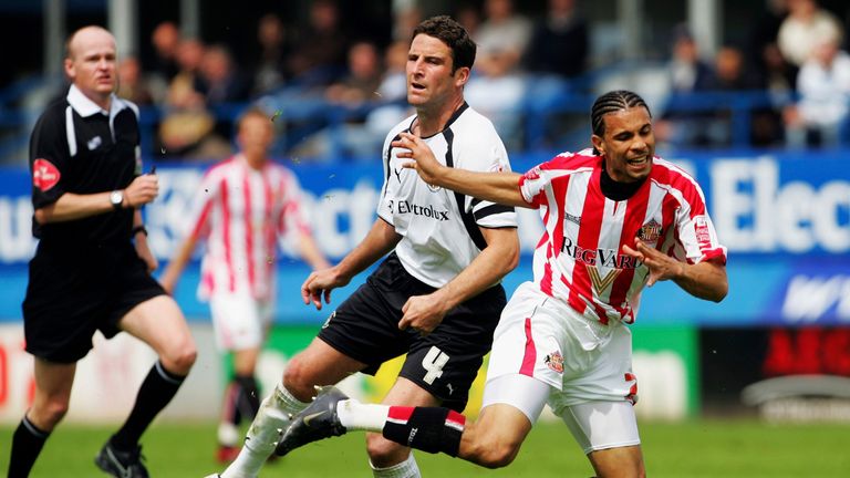 LUTON, UNITED KINGDOM - MAY 06:  Carlos Edwards of Sunderland is tackled by Chris Coyne of Luton Town during the Coca-Cola Championship match between Luton Town and Sunderland at Kenilworth Road on May 6, 2007 in Luton, England.  (Photo by Clive Rose/Getty Images) *** Local Caption *** Carlos Edwards;Chris Coyne