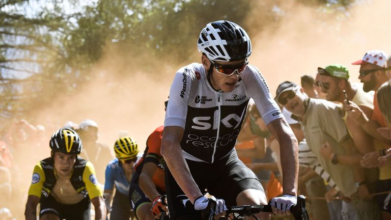 Chris Froome had to battle spectators as well as the mountains on stage 12