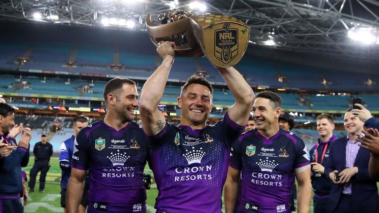 Cooper Cronk (C) is flanked by Billy Slater (R) and Cameron Smith in happier times with Melbourne Storm