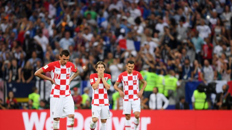 Luka Modric, Mario Mandzukic and Dejan Lovren appear dejected during the 2018 World Cup Final loss to France