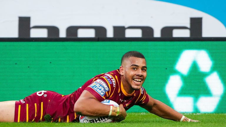 Huddersfield's Darnell McIntosh goes over for his first try