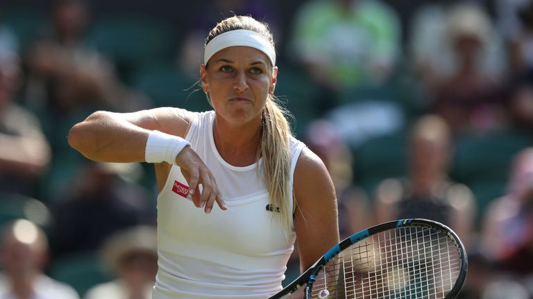Slovakia's Dominika Cibulkova reacts while playing Britain's Johanna Konta in their women's singles second round match on the fourth day of the 2018 Wimbledon Championships at The All England Lawn Tennis Club in Wimbledon, southwest London, on July 5, 2018.