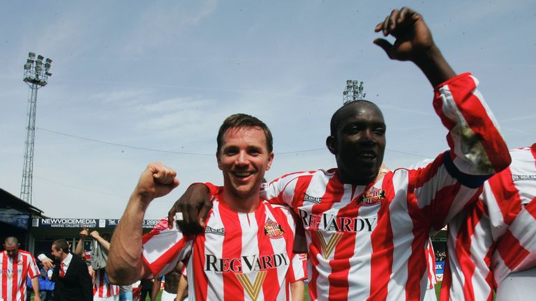 Yorke (right) celebrates winning the Championship title at Kenilworth Road in May 2007