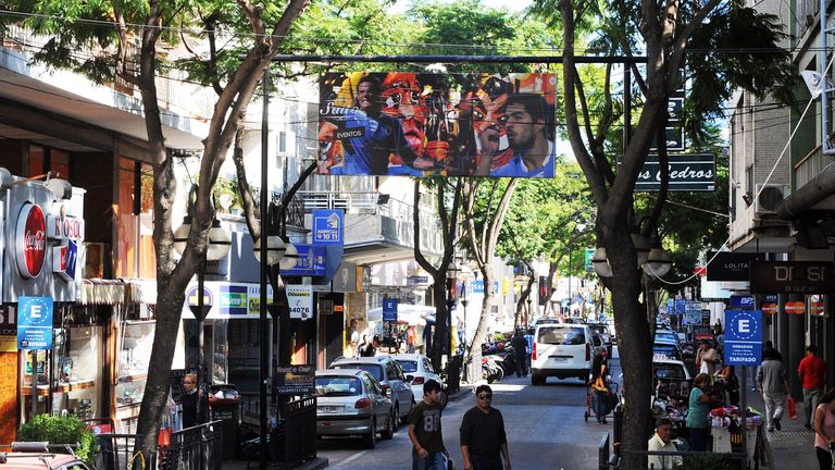 Street view of banner showing Edinson Cavani and Luis Suarez in their home town of Salto, Uruguay