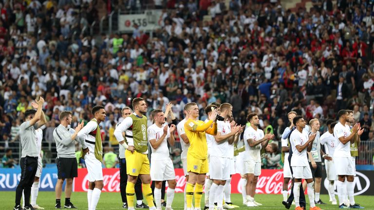  The England team applaud their fans after semi-final disappointment