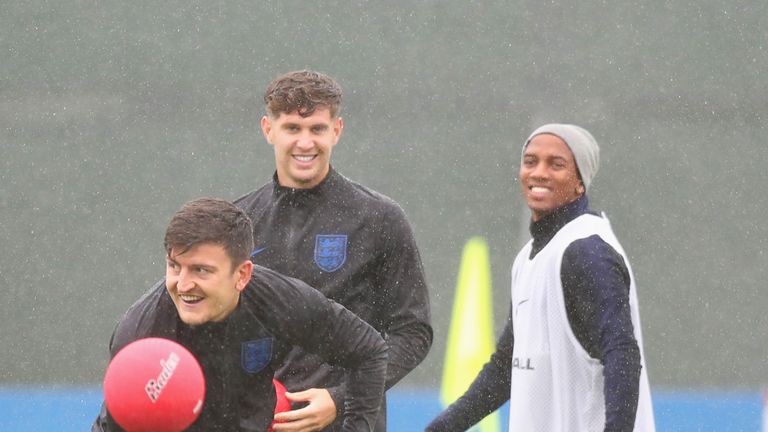 Harry Maguire, John Stones and Ashley Young during an England training session at Spartak Zelenogorsk Stadium on July 6, 2018